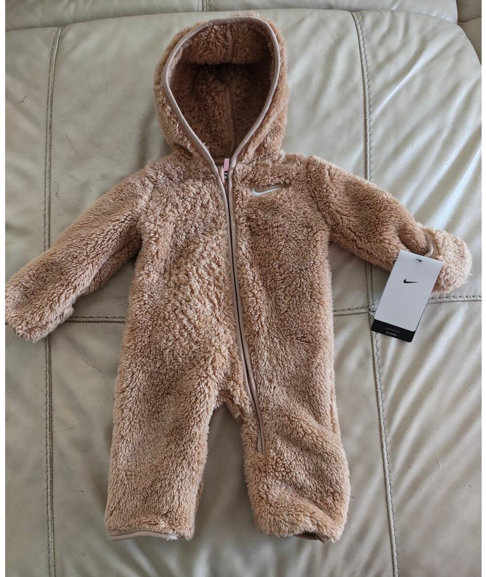 NIKE newborn-3 mths Hooded Sherpa Coverall features a soft teddy-fleece texture